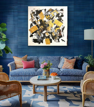 Load image into Gallery viewer, Modern living room with blue walls, a blue sofa, and abstract art.