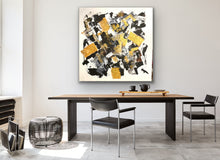 Load image into Gallery viewer, Abstract art piece on a wall above a dining table with chairs.