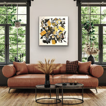 Load image into Gallery viewer, Modern living room with a brown leather sofa, abstract painting, and decorative elements.