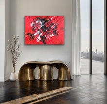 Load image into Gallery viewer, Modern interior with an original red abstract painting by Tony Hammer gold console table, and cityscape view.