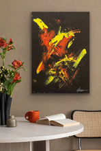 Load image into Gallery viewer, Abstract painting on a wall above a table with a cup and book, against a beige wall.