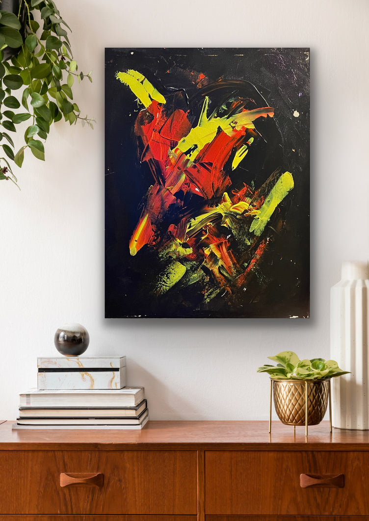 Abstract original painting on a wall above a wooden console table with decorative items.
