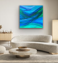 Load image into Gallery viewer, Modern living room with a colorful abstract painting on the wall, a beige sofa, and a wooden side table.