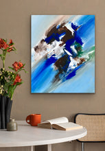 Load image into Gallery viewer, Abstract painting on a wall above a table with a cup, book, and vase.