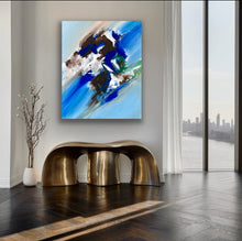 Load image into Gallery viewer, Abstract painting on a wall above a modern gold bench in a room with large windows.