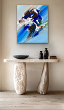 Load image into Gallery viewer, Abstract painting on a wall above a stone console table with decorative items.