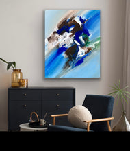 Load image into Gallery viewer, Abstract painting on a wall above a black dresser with a blue chair and decorative items.