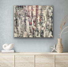 Load image into Gallery viewer, Abstract painting on a wall above a wooden cabinet with decorative items.