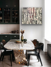 Load image into Gallery viewer, Dining room with a marble table and black chairs, featuring a modern abstract painting on the wall.