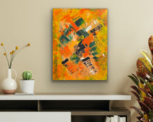 Load image into Gallery viewer, Abstract painting with orange, green, and black colors on a beige wall above a desk.