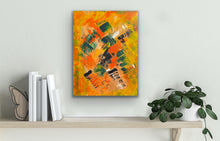 Load image into Gallery viewer, Abstract painting on a wall with books and a plant below
