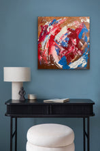 Load image into Gallery viewer, Abstract painting on a blue wall above a black console table with a lamp and books.