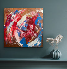 Load image into Gallery viewer, Abstract painting with red, blue, and white on a brown background, displayed on a wall next to a vase with dried flowers.